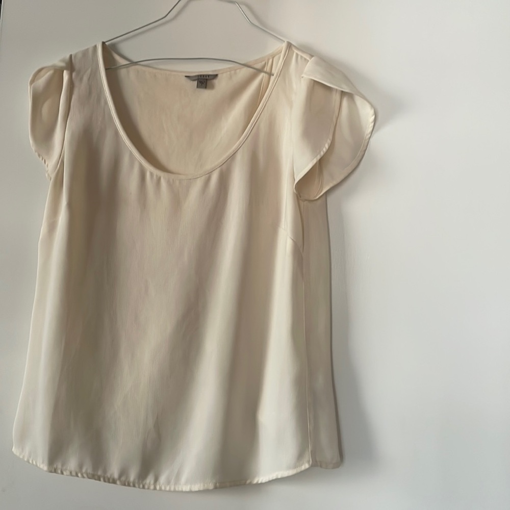 Cream, open back guess top